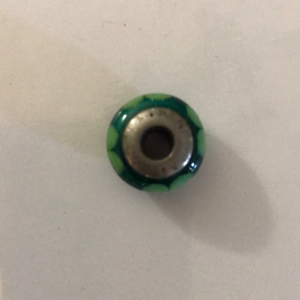 Green 4 leaf clover Pandora charm.